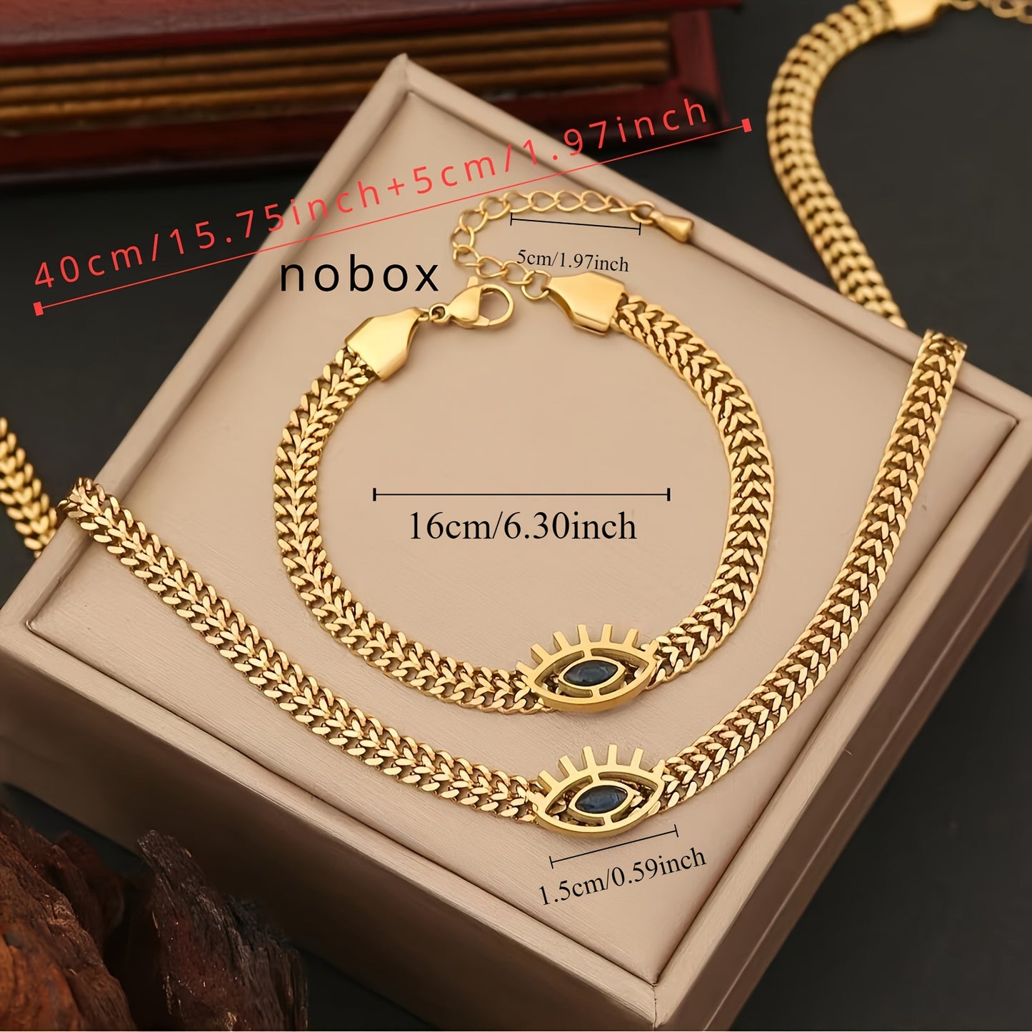 2pcs Golden Stainless Steel Hollow Eye Necklace And Bracelet Set